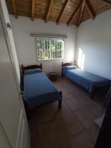 Casa en alquiler en Ostende. 8 ambientes, 3 baños y capacidad de 12 a 18 personas. 