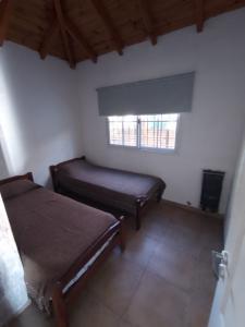 Casa en alquiler en Ostende. 8 ambientes, 3 baños y capacidad de 12 a 18 personas. 